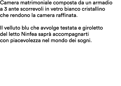 Camera matrimoniale composta da un armadio a 3 ante scorrevoli in vetro bianco cristallino che rendono la camera raff...